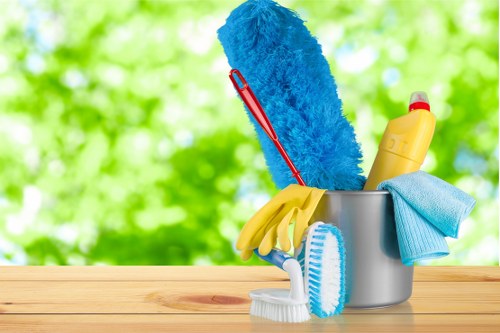Carpet cleaning technician preparing equipment for a booked service