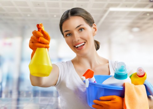 Cleaner using access equipment for upper-floor windows in NW5