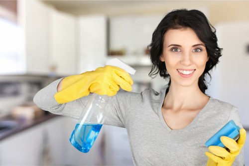 Cleaner preparing a tidy kitchen and bathroom in NW5