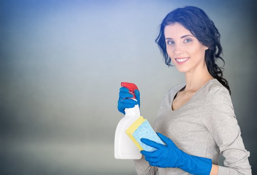 Cleaner restoring a renovated kitchen in NW5 after building work